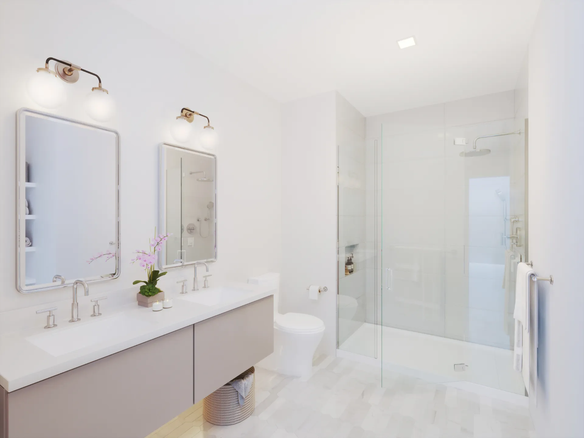 Primary bath with dual vanity, frameless glass shower, and marble tile